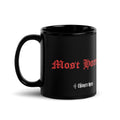A MOST HORRIBLE black glossy mug
